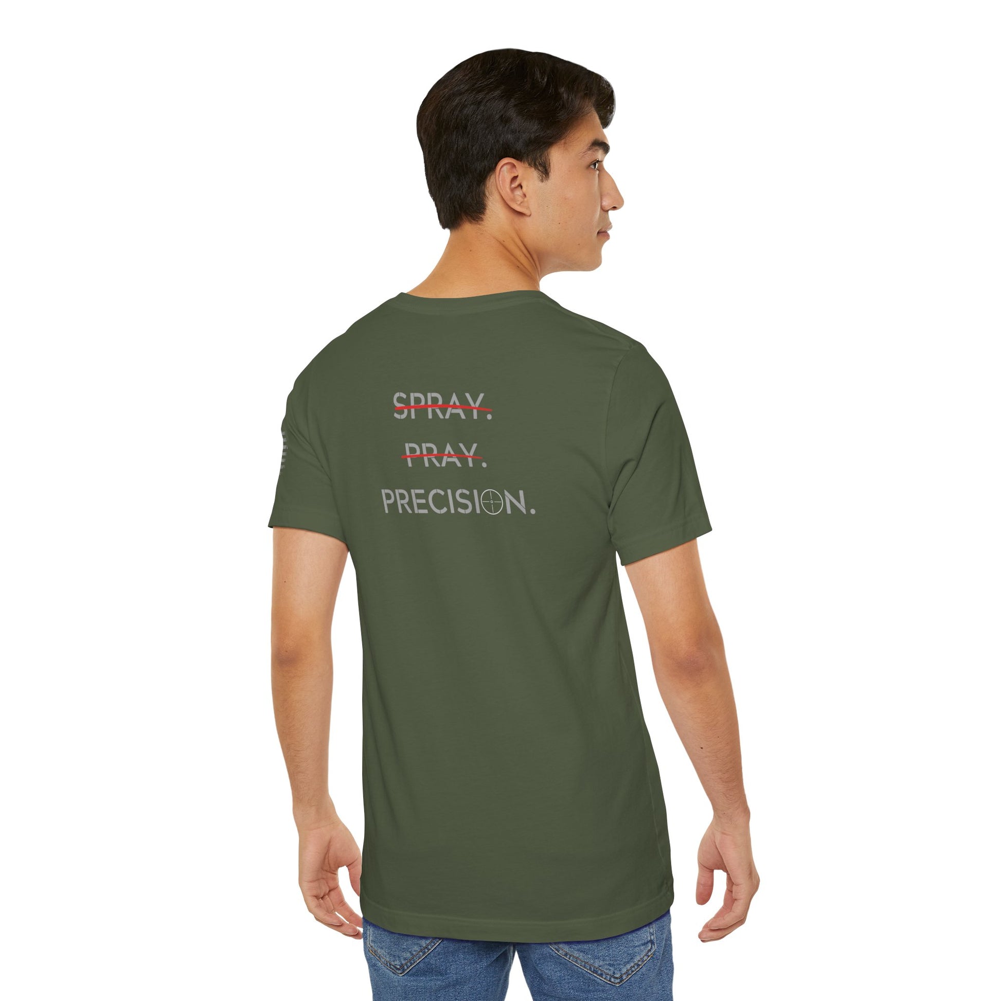 Person wearing a green t-shirt with text on the back, standing against a white background