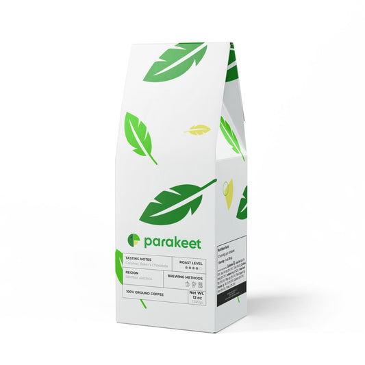 Parakeet coffee packaging with green leaf design on a white background