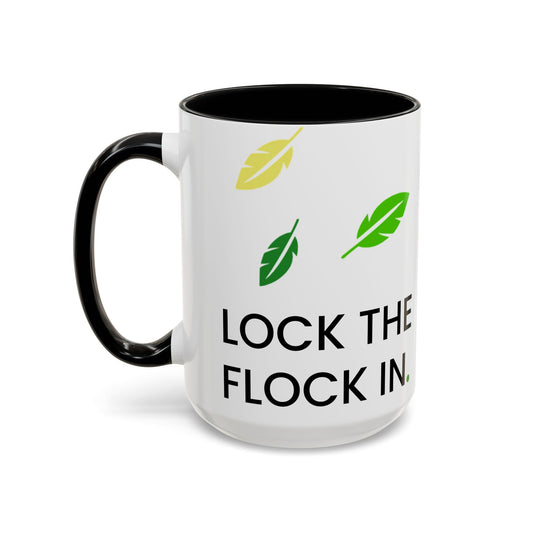White mug with black interior, black handle, and decorative elements on a white background