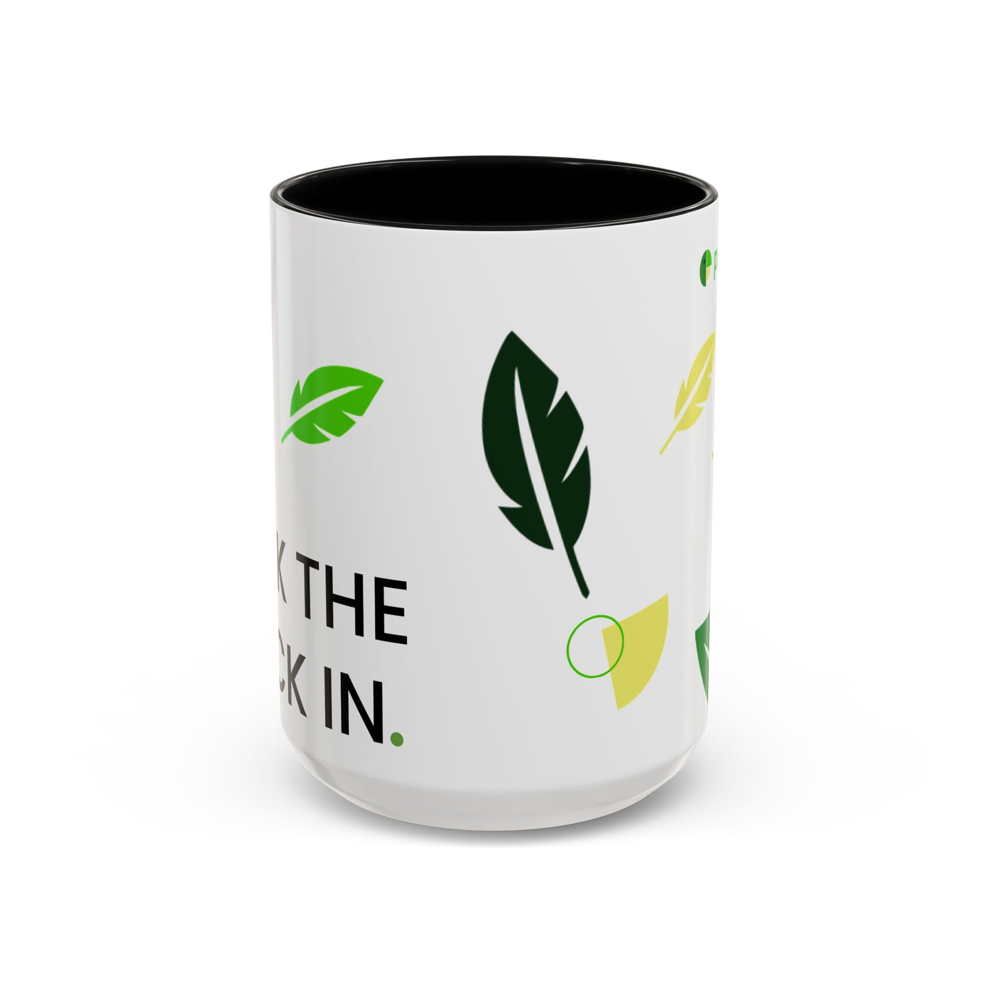 White mug with green leaf designs and text on a white background